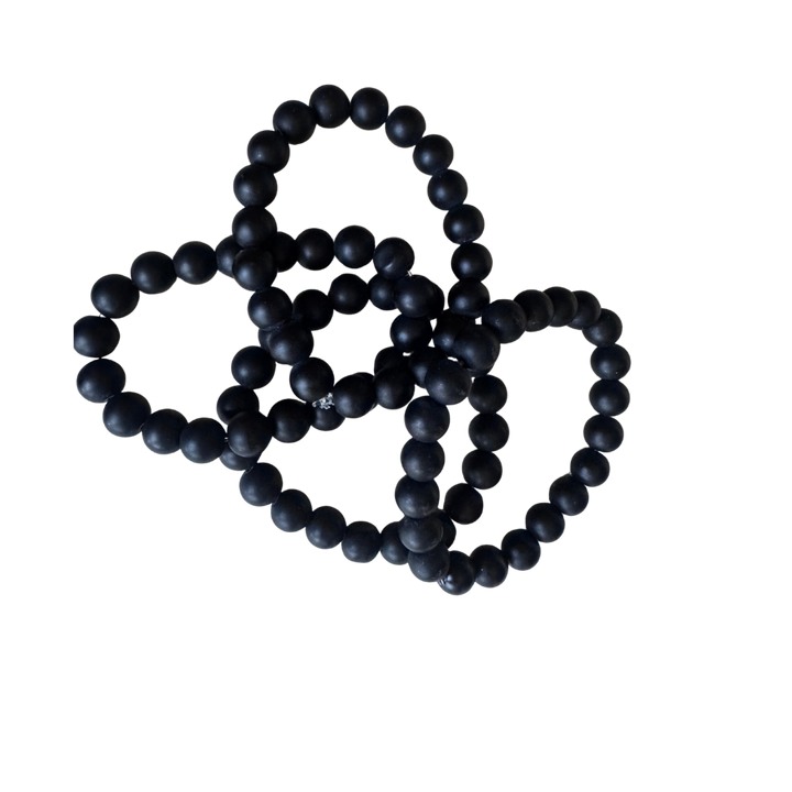 Bild zeigt mehrere Onyx Armketten